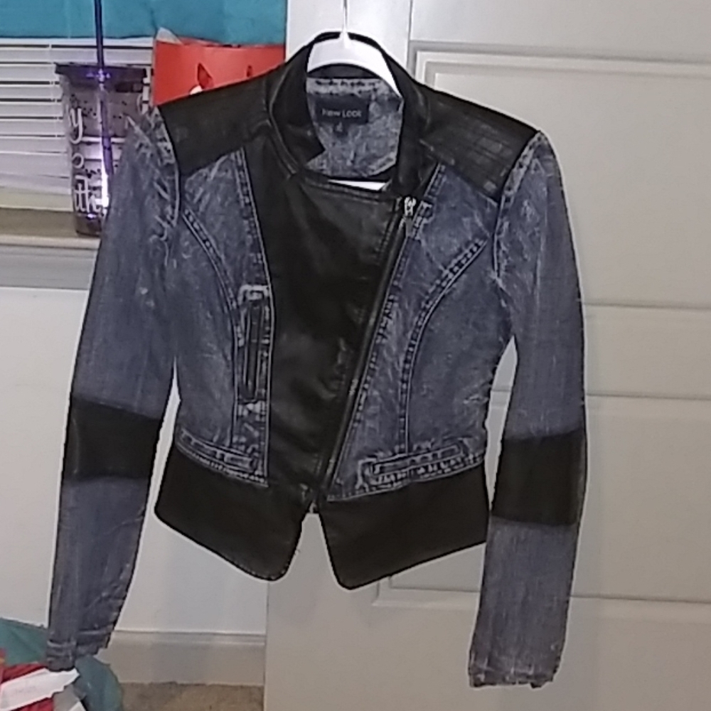 A jean jacket with leather